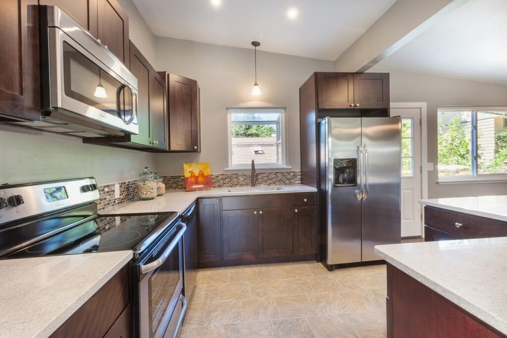 kitchen, dark cabinets, dark cabinetry, stainless steel appliances, tile, quartz counter, lighting, brown kitchen, brown dark, kitchen, kitchen, kitchen, kitchen, kitchen